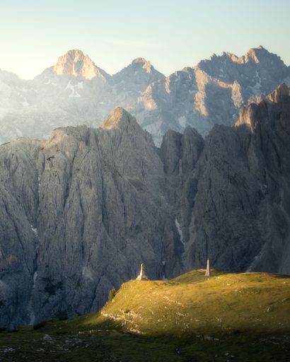 A vertical shot of the Dolomite Mountains at sunset