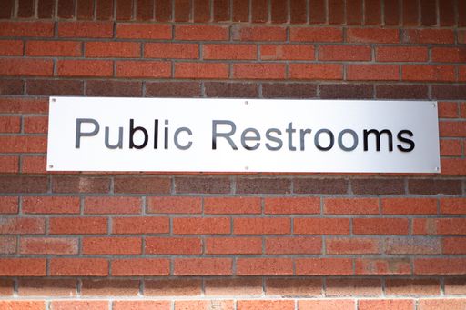 Public restroom sign located in Holland Michigan