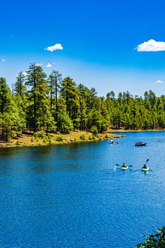 A beautiful vertical shot of the Woods Canyon Lake near the coast of Arizona on a bright day
