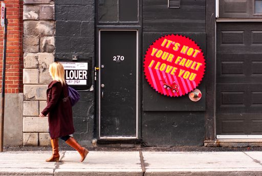 Montreal, Quebec / Canada - March 13 2013: Signs that Say A Louer (To Rent), 270 and It's Not Your Fault I Love You in Queen Street