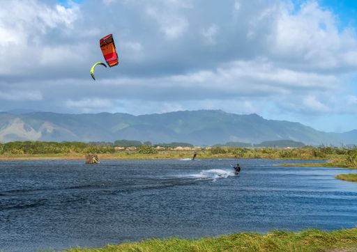 kite wind surfing at Otaki River. Following the storm conditions ideal for kite wind surfing at Otaki River Mouth in Kapiti, New Zealand