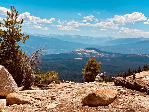 A low angle shot of beautiful mountains on a sunny day