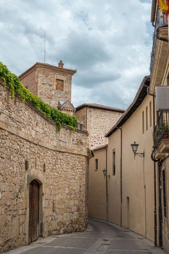 A vertical shot of a narrow street in the old quarter of Salamanca, Spain