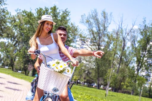 A beautiful lovely couple enjoying picnic day together in the park