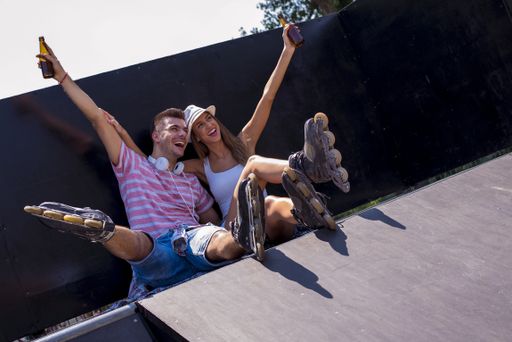 A beautiful lovely couple enjoying picnic day together in the park