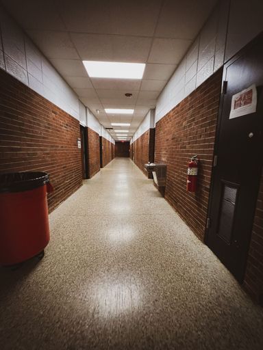 A vertical shot of a hallway at school