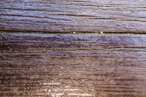 A closeup shot of a wooden surface with a copy space