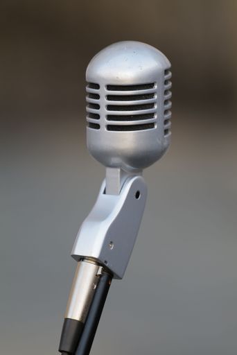A shallow focus of a gray retro style microphone