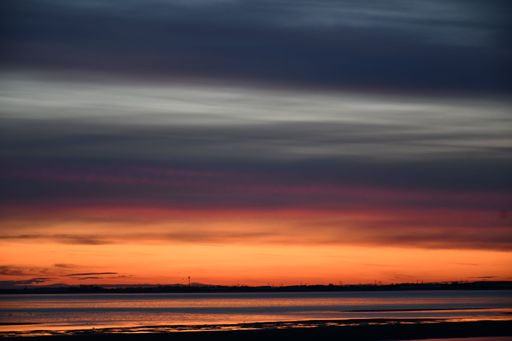 A beautiful cloudscape over sea during sunset