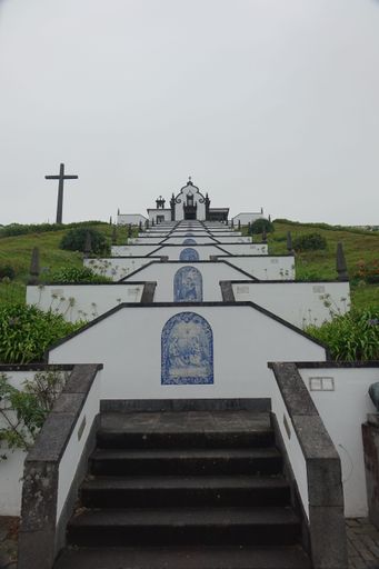 Vila Franca do Campo, Sao Miguel, Azores, Portugal, 10 August 2019, Steep stairs leading up to the white chapel Ermida de Nossa Senhora da Paz