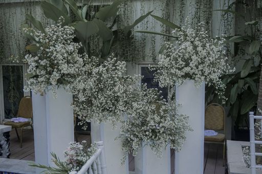 A close up shot of beautiful wedding table decorated with white flowers