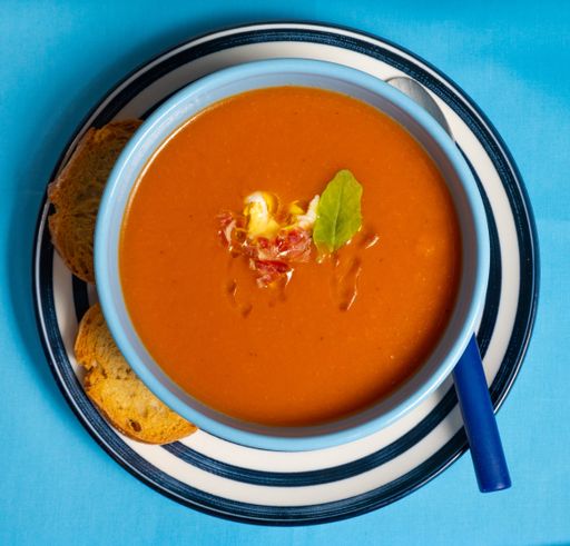A delicious homemade gazpacho in blue bowl