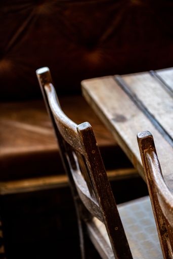 A soft focus of a wooden table and chair