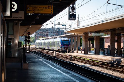 A train arriving at Pisa railway station in Tuscany, Italy