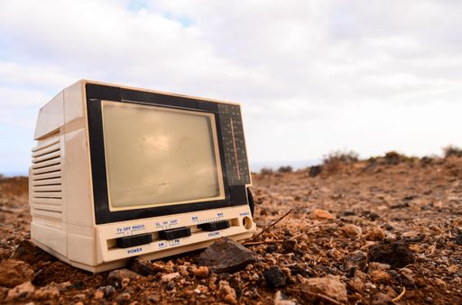 Broken Gray Television Abandoned in the Desert