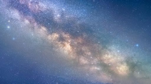 A scenic view of a breathtaking starry night sky