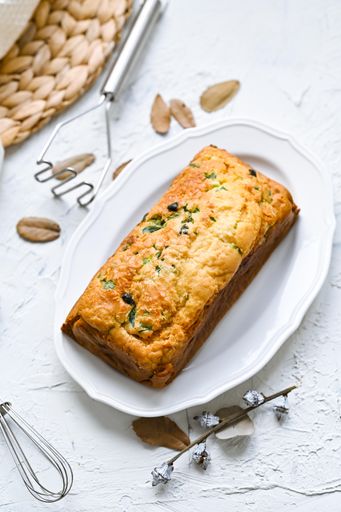 A vertical shot of a bread with spinach
