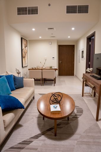 A spacious bright studio apartment in Scandinavian style and warm pastel white and beige colors, interior design, vertical