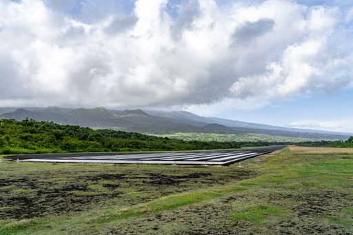 A view of the runway of the Hana Airport in Maui, Hawaii, code HNM, from the east side looking west down the runway at ground level.