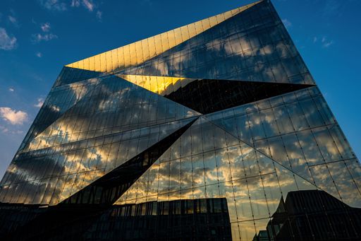 Berlin Cube, modern office building in Berlin near Central Station at sunset