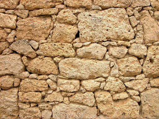 An old stone wall texture in Alacati, Izmir, Turkey
