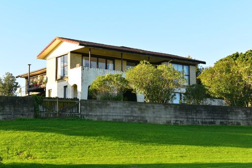 Auckland / New Zealand - July 1 2020: View of houses at Rotary Walkway