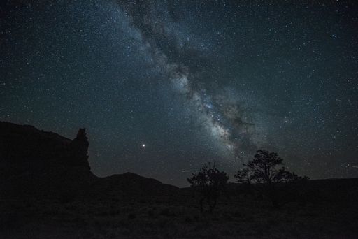 A beautiful night with a sky full of stars and Milky Way in Via Lattea in Capitol Reef, USA