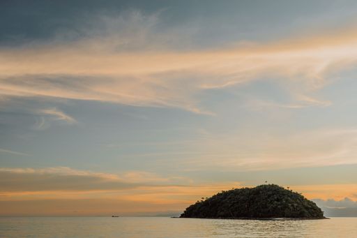 A mesmerizing view of the golden sunset over the sea