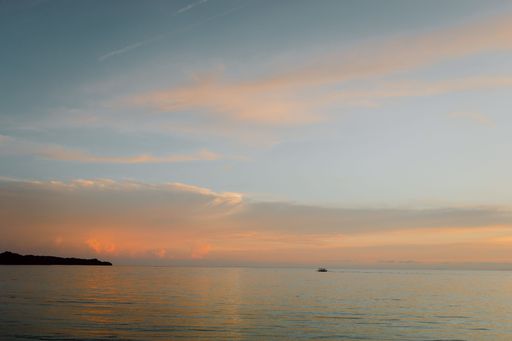 A mesmerizing view of the golden sunset over the sea