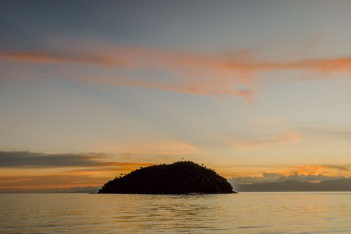 A mesmerizing view of the golden sunset over the sea