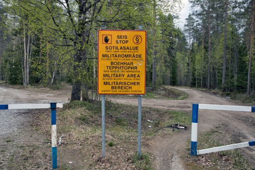 Military area keep out sign in Finnish, Swedish, Russian, English and German texts, Finland
