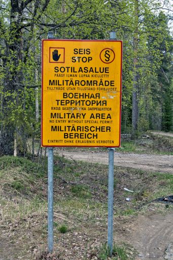 Military area keep out sign in Finnish, Swedish, Russian, English and German texts, Finland