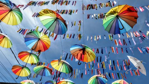 A low angle shot of colorful umbrella decorations in the city of Porto de Galinhas, Brazil