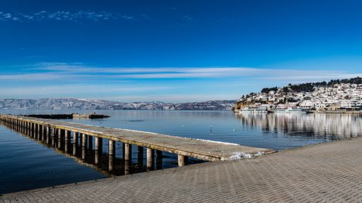 A mesmerizing view of the small bridge on Ohrid lake, Macedonia in winter