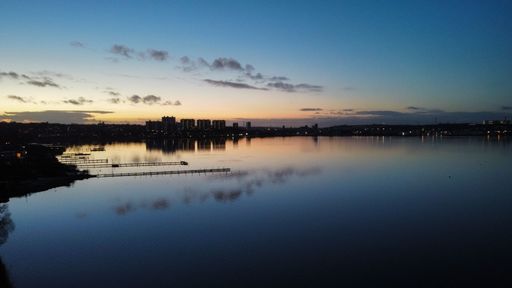 A 4K drone shot of a sunset in winter. Kolding, Danish seaport,  Region of Southern Denmark