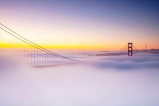 A stunning view of the Golden Gate Bridge rising above the fog in San Francisco, California, USA