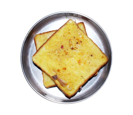 A top view of toast on a plate for breakfast isolated on a white background