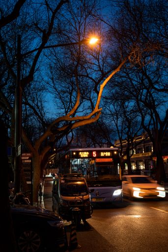 A vertical night view of city traffic in Beijing, China