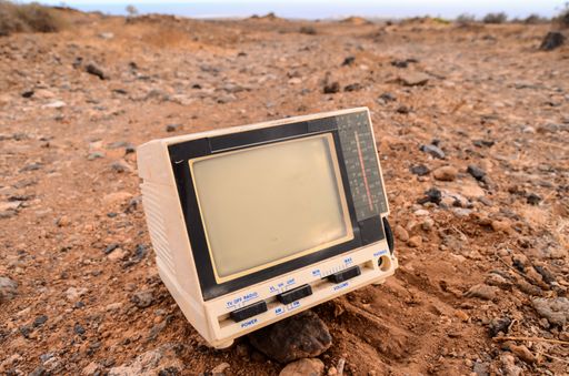 Broken Gray Television Abandoned in the Desert