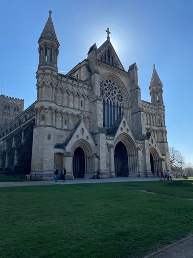 A vertical shot of the Romanesque St Albans Cathedral in Hertfordshire, England on a bright sunny day