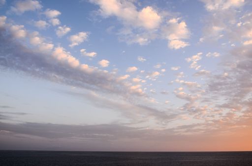 Cloudscape, Colored Clouds at Sunset near the Ocean