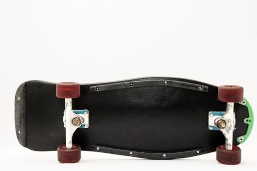Vintage Style Black Skateboard on a white Background