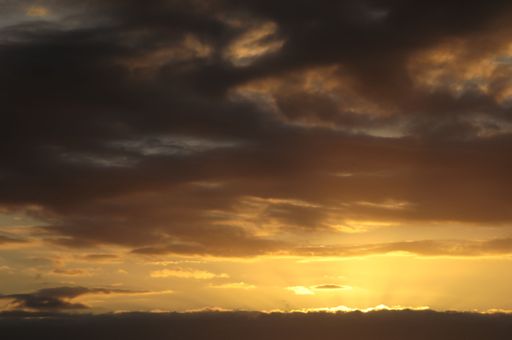 Colored Sunset Clouds Over the Atlantic Ocean in Tenerife South Spain