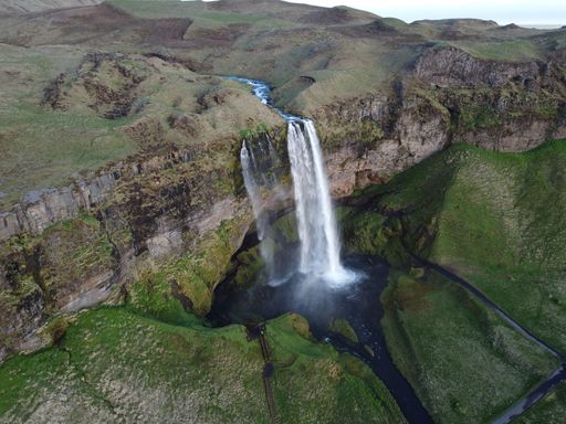 An aerial shot of the Seljalandsfoss waterfalls in the South Region of Iceland