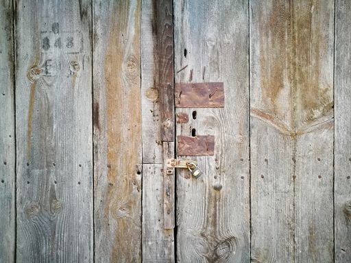 A close up shot of a stained wooden old door - perfect for a background