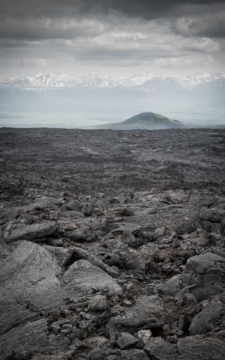 A vertical shot of volcanoes and solidified lava in Kamchatka, Russia