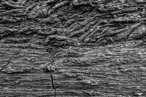 A grayscale shot of solidified lava texture in Kamchatka, Russia - perfect for wallpaper