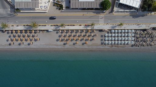 An aerial view of a road near the sea in Kalamata, Greece
