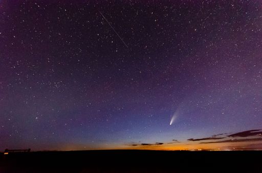 A breathtaking view of Neowise comet in blue starry sky from Great Falls, Montana