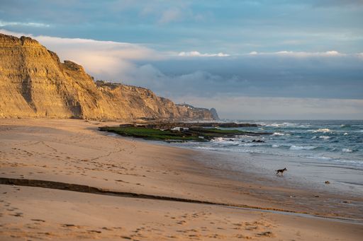 Scenic view of the Praia do Magoito on a sunny day, Sintra, Portugal